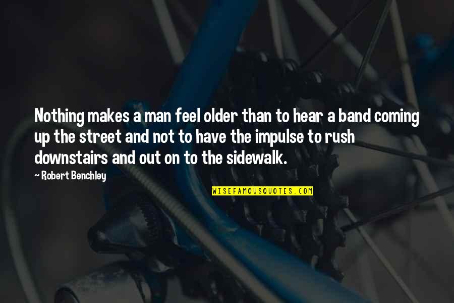 Man In The Street Quotes By Robert Benchley: Nothing makes a man feel older than to Man In The Street Quotes By Robert Benchley: Nothing makes a man feel older than to
