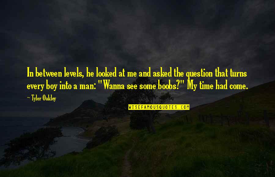 Man Not A Boy Quotes By Tyler Oakley: In between levels, he looked at me and Man Not A Boy Quotes By Tyler Oakley: In between levels, he looked at me and