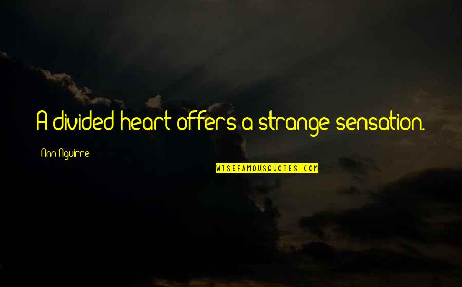 Mauvy Night Quotes By Ann Aguirre: A divided heart offers a strange sensation. Mauvy Night Quotes By Ann Aguirre: A divided heart offers a strange sensation.