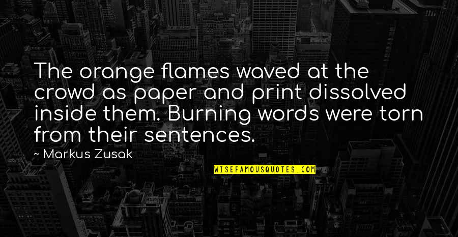 Meanings Of Words Quotes By Markus Zusak: The orange flames waved at the crowd as