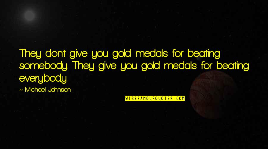 Medals Quotes By Michael Johnson: They don't give you gold medals for beating