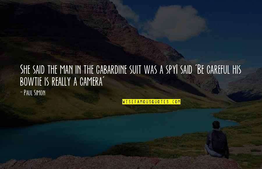 Men In Suit Quotes By Paul Simon: She said the man in the gabardine suit