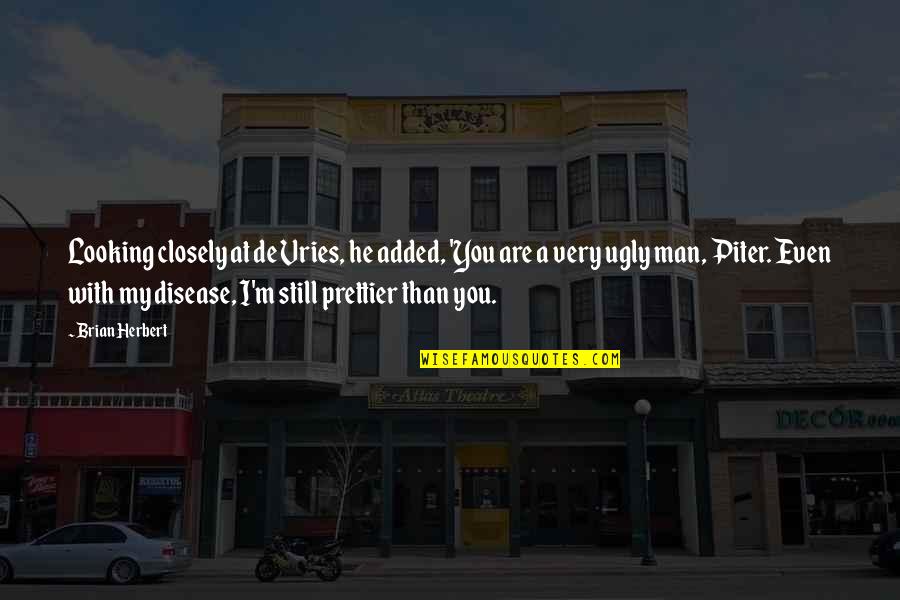 Menifesting Quotes By Brian Herbert: Looking closely at de Vries, he added, 'You