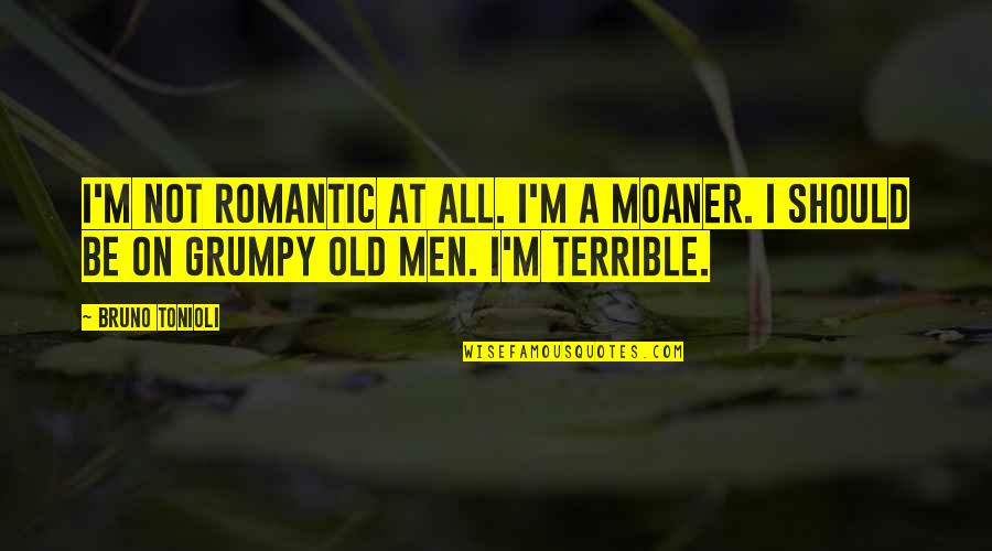 Moaner Quotes By Bruno Tonioli: I'm not romantic at all. I'm a moaner.