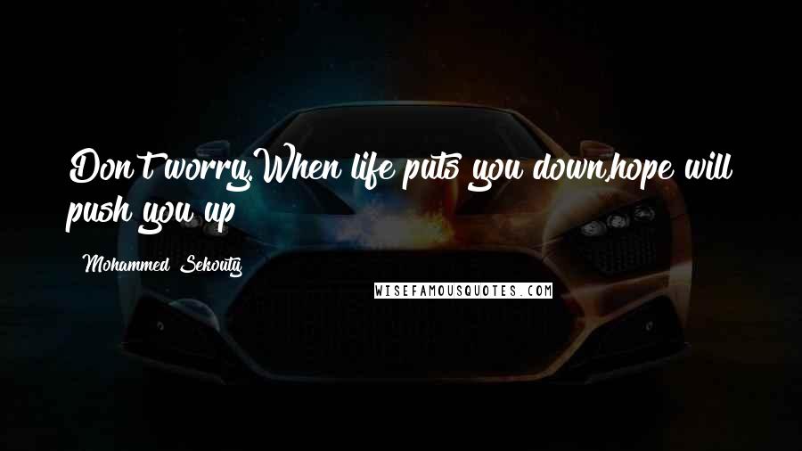 Mohammed Sekouty quotes: Don't worry.When life puts you down,hope will push you up