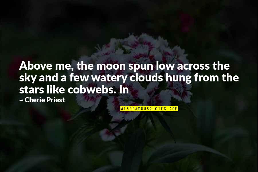 Moon And Clouds Quotes By Cherie Priest: Above me, the moon spun low across the