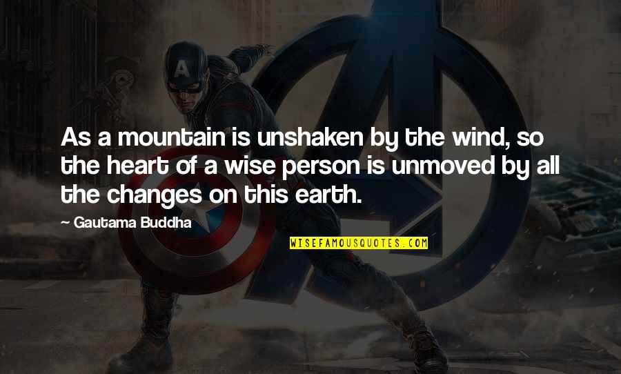 Mountain Of Quotes By Gautama Buddha: As a mountain is unshaken by the wind,
