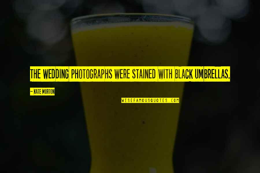 Muddied Crimson Quotes By Kate Morton: The wedding photographs were stained with black umbrellas.