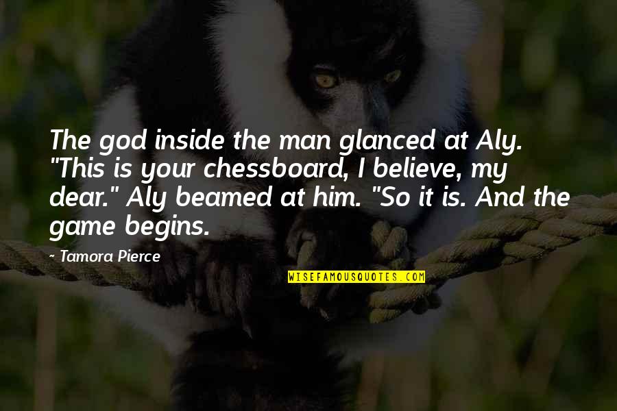 My God Is Quotes By Tamora Pierce: The god inside the man glanced at Aly.