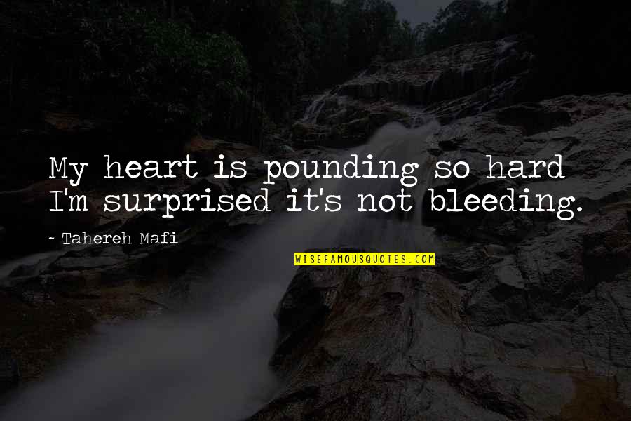 My Heart Bleeding Quotes By Tahereh Mafi: My heart is pounding so hard I'm surprised