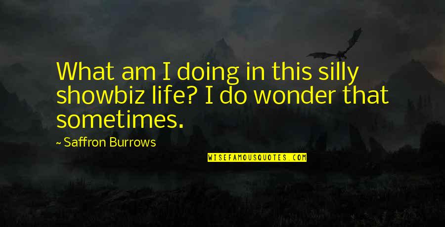 Mystical Forest Quotes By Saffron Burrows: What am I doing in this silly showbiz