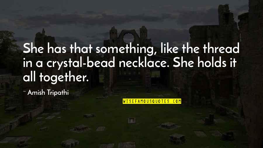 Necklace Quotes By Amish Tripathi: She has that something, like the thread in