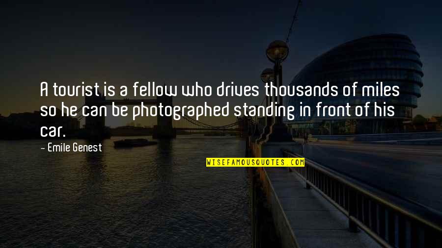 Needle Eye Quotes By Emile Genest: A tourist is a fellow who drives thousands