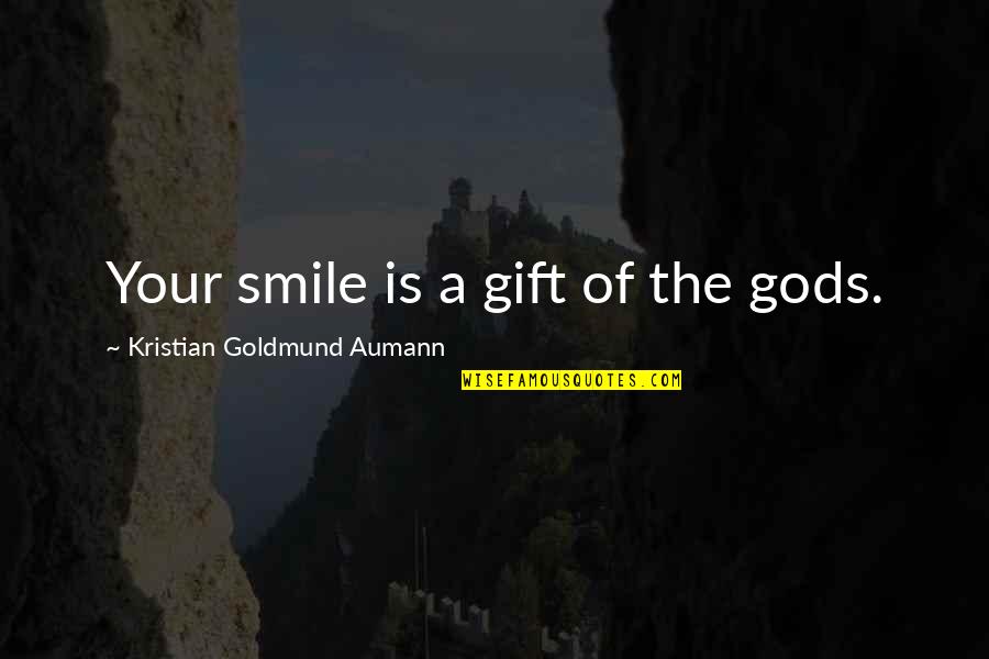 New Year Inspiring Quotes By Kristian Goldmund Aumann: Your smile is a gift of the gods.