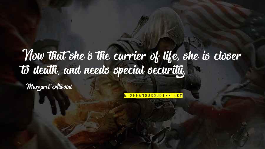 Newcombs Wildflower Quotes By Margaret Atwood: Now that she's the carrier of life, she