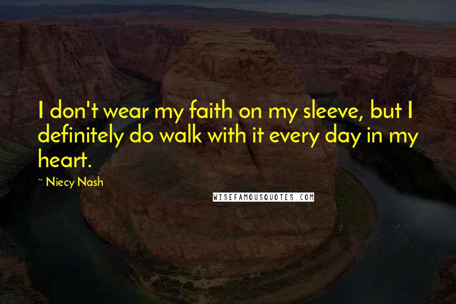 Niecy Nash quotes: I don't wear my faith on my sleeve, but I definitely do walk with it every day in my heart.
