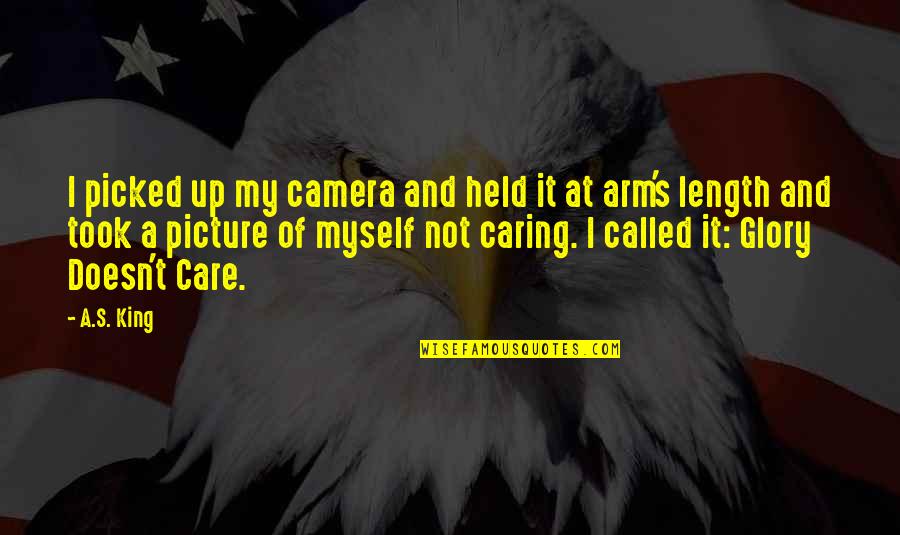 Not Caring Quotes By A.S. King: I picked up my camera and held it