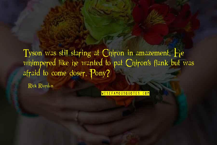 Ouma Mana Quotes By Rick Riordan: Tyson was still staring at Chiron in amazement. Ouma Mana Quotes By Rick Riordan: Tyson was still staring at Chiron in amazement.