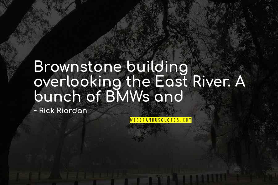 Overlooking Quotes By Rick Riordan: Brownstone building overlooking the East River. A bunch