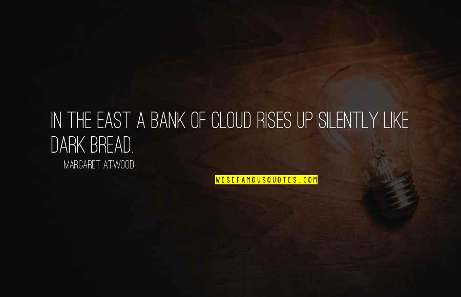 Patrio Quotes By Margaret Atwood: In the east a bank of cloud rises