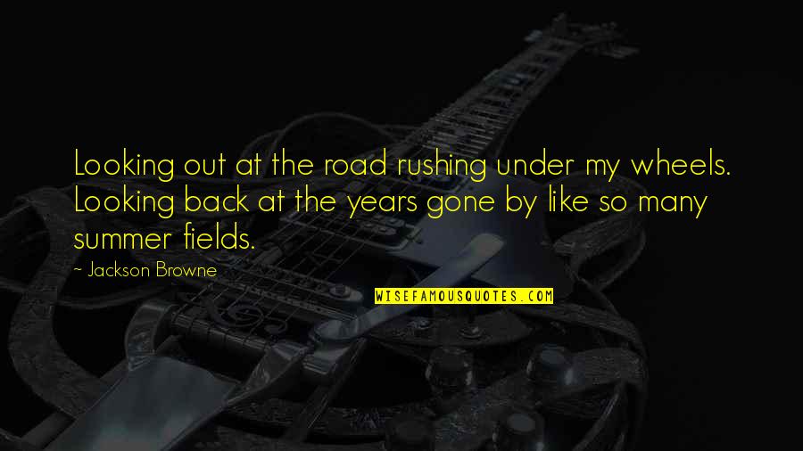 Paulsen Construction Quotes By Jackson Browne: Looking out at the road rushing under my Paulsen Construction Quotes By Jackson Browne: Looking out at the road rushing under my