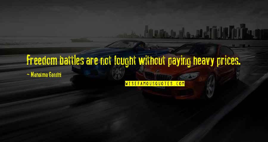 Paying Quotes By Mahatma Gandhi: Freedom battles are not fought without paying heavy