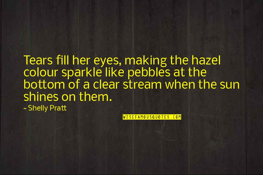 Pebbles Quotes By Shelly Pratt: Tears fill her eyes, making the hazel colour
