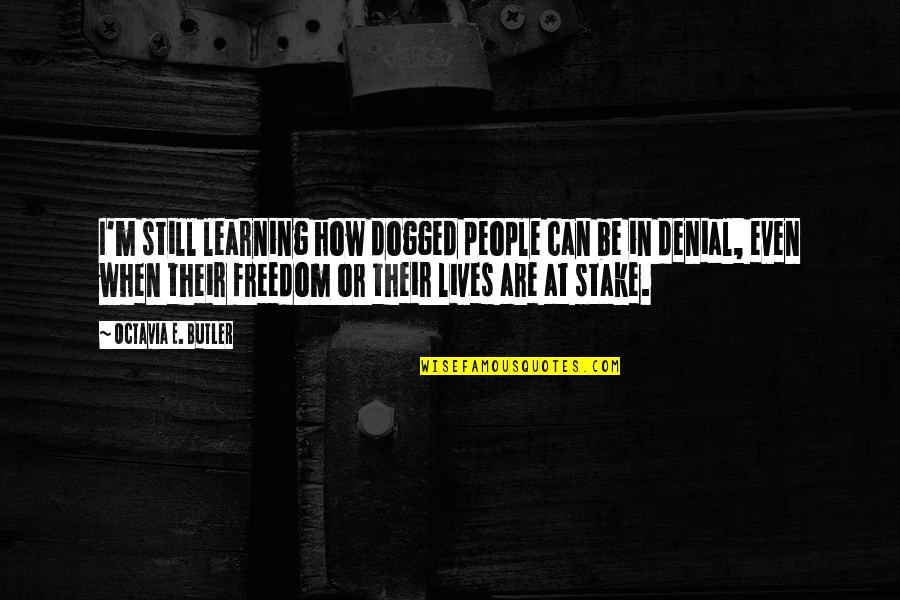 People In Denial Quotes By Octavia E. Butler: I'm still learning how dogged people can be