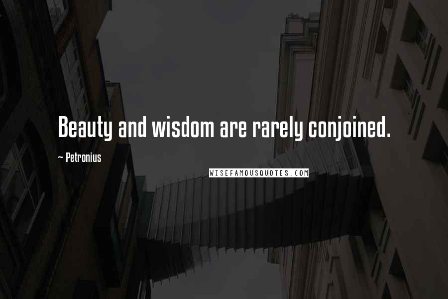 Petronius quotes: Beauty and wisdom are rarely conjoined.