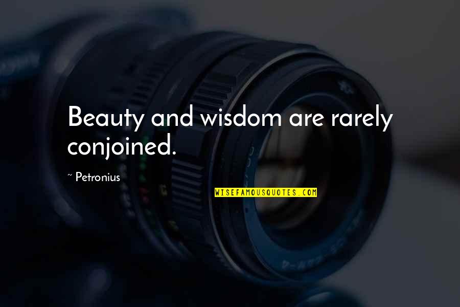 Petronius Quotes By Petronius: Beauty and wisdom are rarely conjoined.