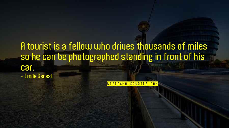 Photographed Quotes By Emile Genest: A tourist is a fellow who drives thousands