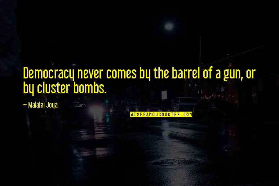 Pill Bottle Quotes By Malalai Joya: Democracy never comes by the barrel of a