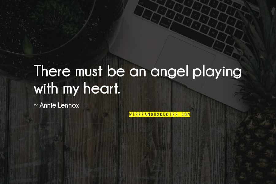 Playing With My Heart Quotes By Annie Lennox: There must be an angel playing with my