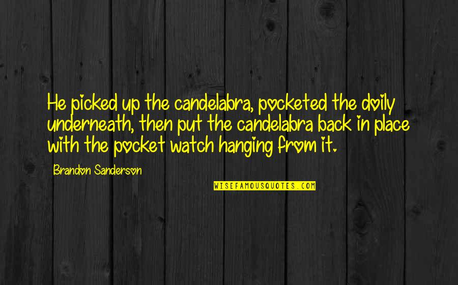 Pocket Watch Quotes By Brandon Sanderson: He picked up the candelabra, pocketed the doily