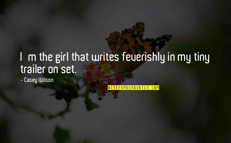 Poems And Photography Quotes By Casey Wilson: I'm the girl that writes feverishly in my