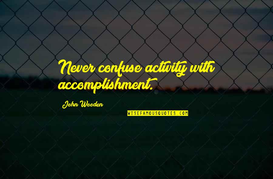 Prefect Quotes By John Wooden: Never confuse activity with accomplishment.