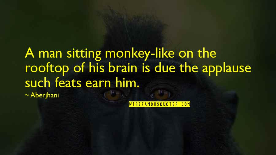Pro Trans Quotes By Aberjhani: A man sitting monkey-like on the rooftop of Pro Trans Quotes By Aberjhani: A man sitting monkey-like on the rooftop of