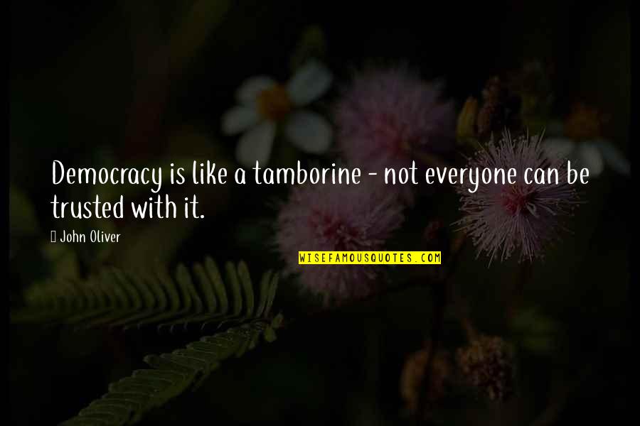 Professional Mask Quotes By John Oliver: Democracy is like a tamborine - not everyone