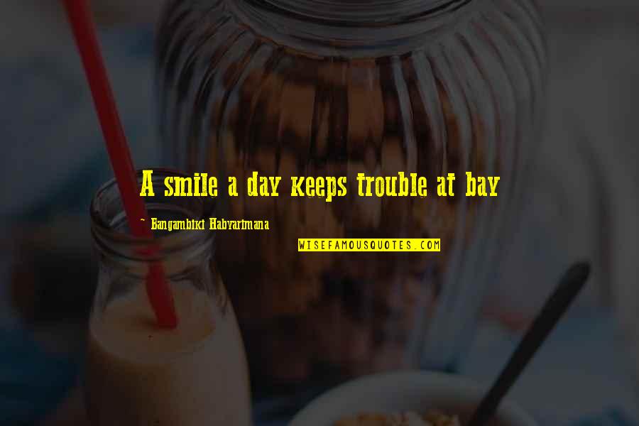 Provalija Quotes By Bangambiki Habyarimana: A smile a day keeps trouble at bay Provalija Quotes By Bangambiki Habyarimana: A smile a day keeps trouble at bay