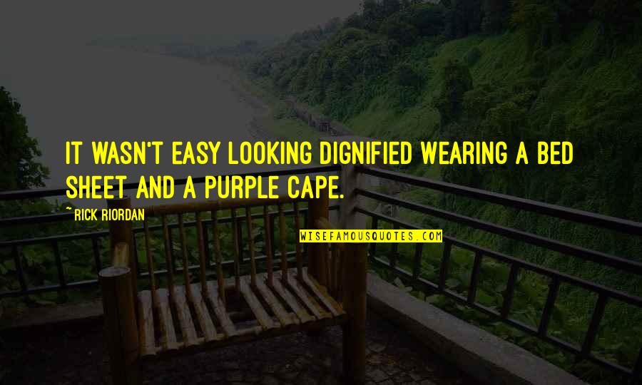 Purple Quotes By Rick Riordan: It wasn't easy looking dignified wearing a bed