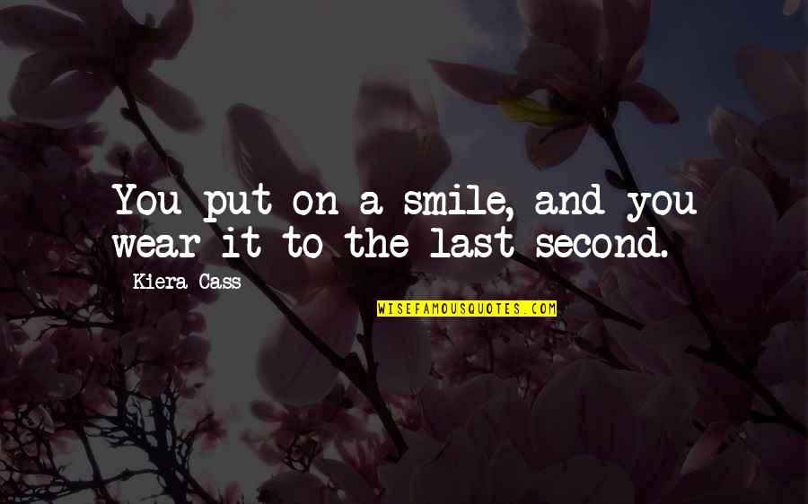 Put A Smile On Quotes By Kiera Cass: You put on a smile, and you wear