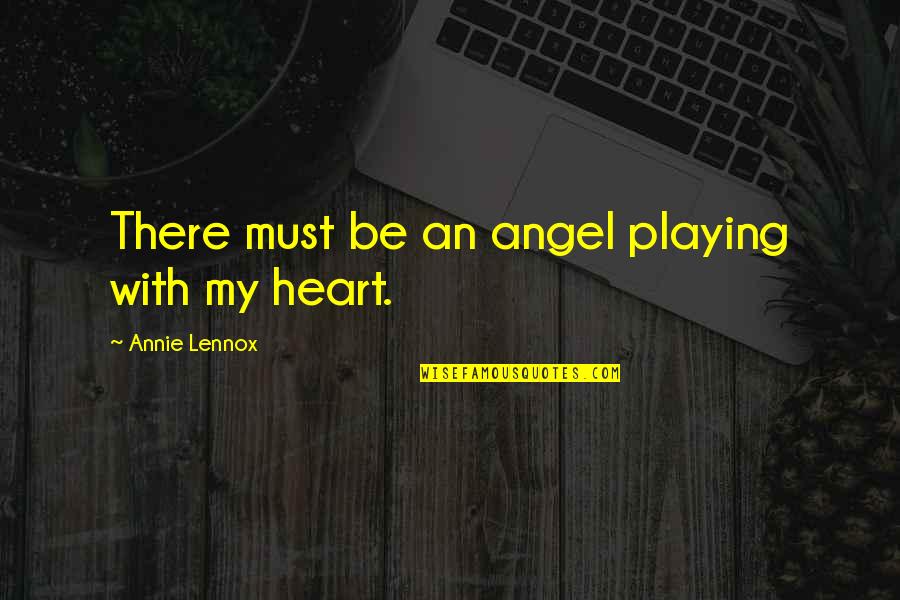 Quantity Of Love Quotes By Annie Lennox: There must be an angel playing with my