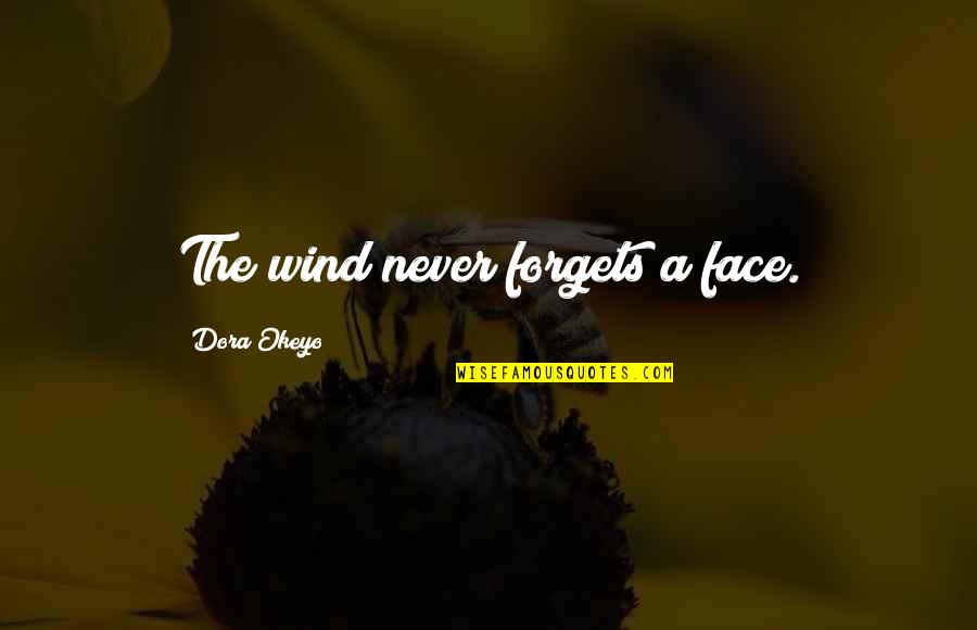 Quavers Quotes By Dora Okeyo: The wind never forgets a face.