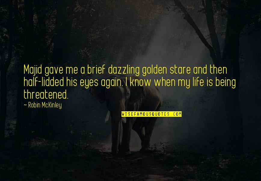 Quotes Rarely Used Quotes By Robin McKinley: Majid gave me a brief dazzling golden stare