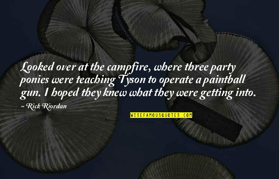 Railcar Omaha Quotes By Rick Riordan: Looked over at the campfire, where three party Railcar Omaha Quotes By Rick Riordan: Looked over at the campfire, where three party