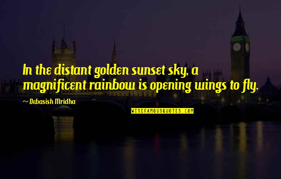 Rainbow Inspirational Quotes By Debasish Mridha: In the distant golden sunset sky, a magnificent