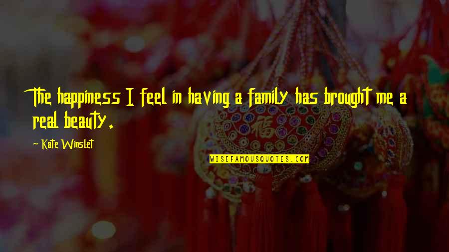 Real Feel Quotes By Kate Winslet: The happiness I feel in having a family