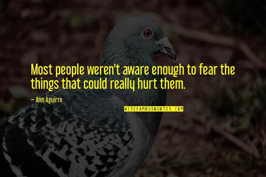 Really Hurt Quotes By Ann Aguirre: Most people weren't aware enough to fear the