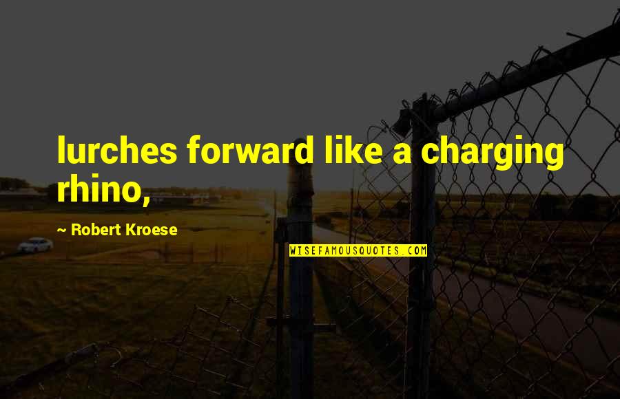 Rhino Quotes By Robert Kroese: lurches forward like a charging rhino,