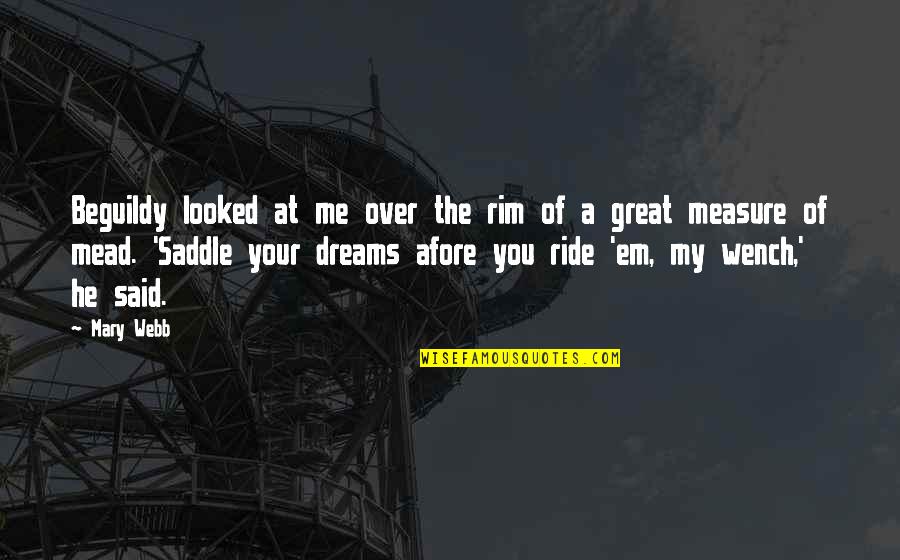 Ride At Quotes By Mary Webb: Beguildy looked at me over the rim of Ride At Quotes By Mary Webb: Beguildy looked at me over the rim of